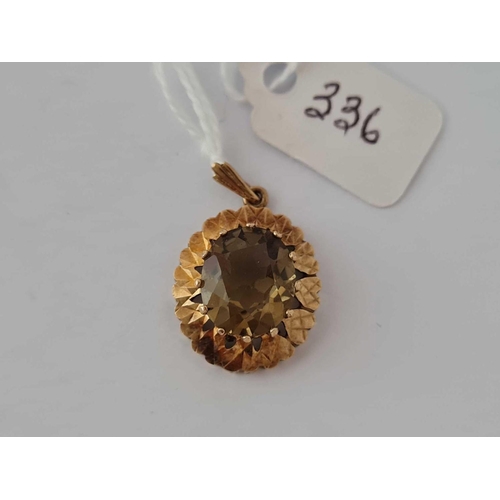 336 - A smokey quartz pendant 9ct    3.9 gms