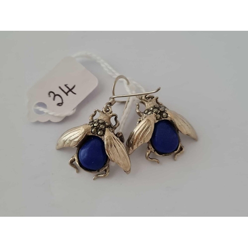 34 - A pair of silver and marcasite lapis drop earrings in the form of bees