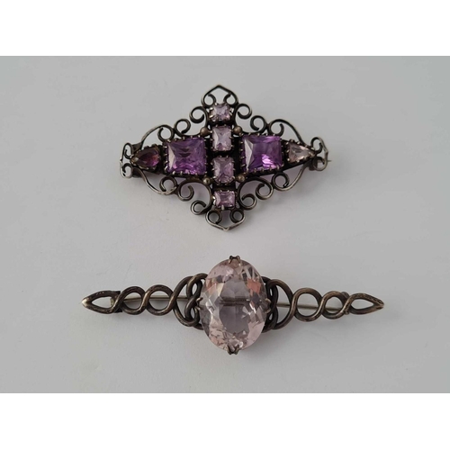 351 - Two arts and crafts silver and amethyst brooches