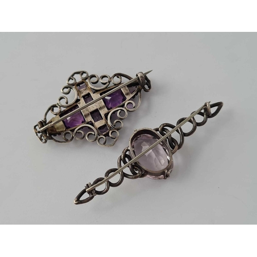 351 - Two arts and crafts silver and amethyst brooches