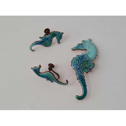 353 - A 20th century hand crafted enamel on copper seahorse set