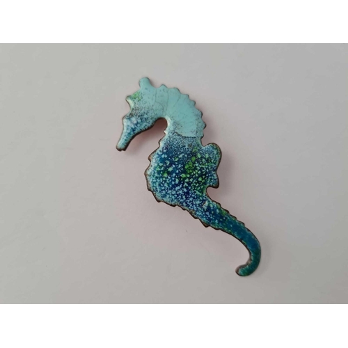 353 - A 20th century hand crafted enamel on copper seahorse set