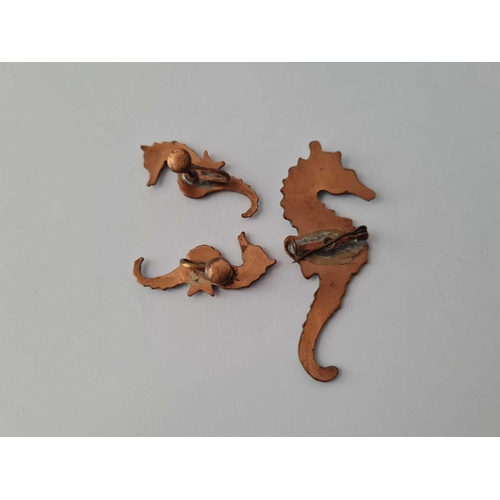 353 - A 20th century hand crafted enamel on copper seahorse set