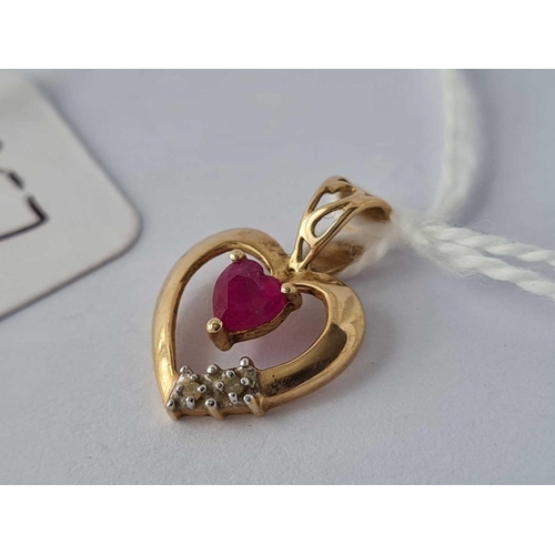 357 - A heart shaped pendant with ruby and diamonds 9ct