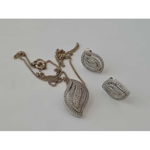 40 - A FANCY TEAR DROP LEAF DESIGNED DIAMOND SUITE OF EARRINGS AND MATCHING PENDANT NECKLACE IN SILVER