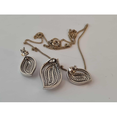 40 - A FANCY TEAR DROP LEAF DESIGNED DIAMOND SUITE OF EARRINGS AND MATCHING PENDANT NECKLACE IN SILVER