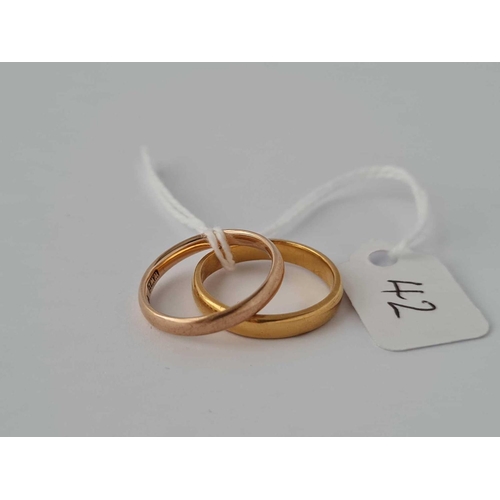 42 - A 22ct gold wedding band size L    3.4 gms together with a 9ct wedding band size K    1.5 gms