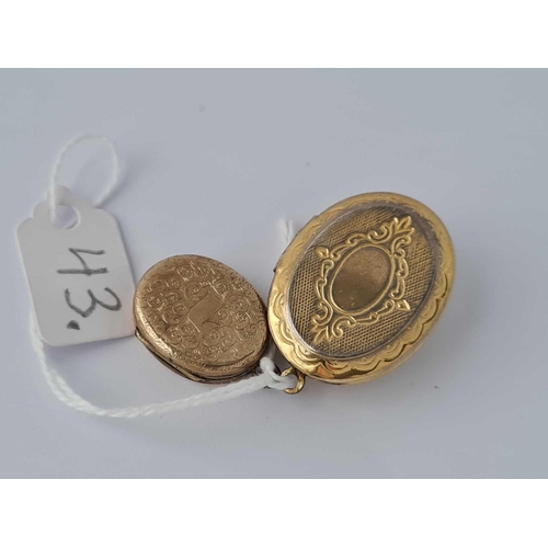 43 - A oval and enamel memorial locket together with a oval gilt locket