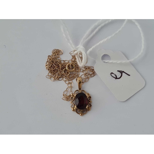 5 - A single stone garnet pendant 9ctt on 9ct chain 16 inch