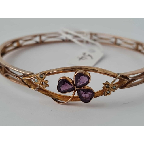 54 - A EDWARDIAN AMETHYST AND PEARL SET CLOVER LEAF BANGLE 9CT   14GMS