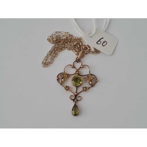 60 - A peridot and pearl pendant on chain 9ct 18 inch    3.4 gms