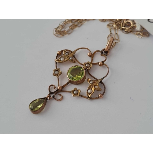 60 - A peridot and pearl pendant on chain 9ct 18 inch    3.4 gms