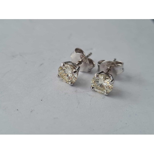 66 - A GOOD PAIR OF 18CT MOUNTED DIAMOND STUDS over 1 carat of diamonds in total