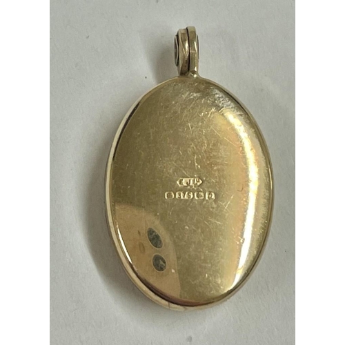 164 - A 9ct locket