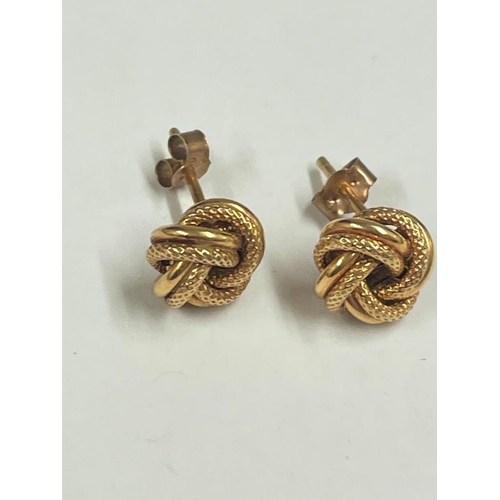 203 - A pair of Celtic knot ear studs 9ct