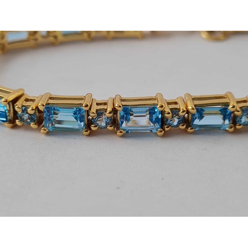 36 - A blue stone silver gilt bracelet