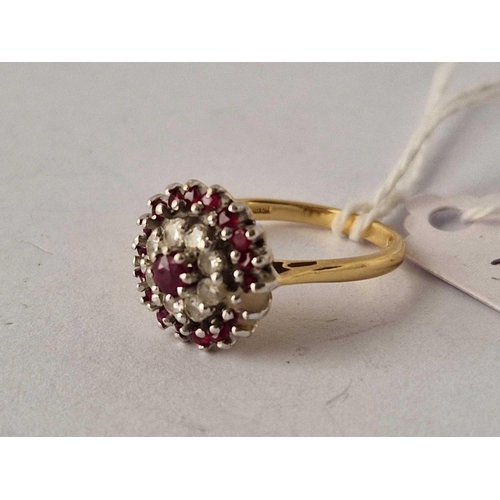 1 - A DIAMOND AND RUBY CLUSTER RING, 18ct size N, 5 g