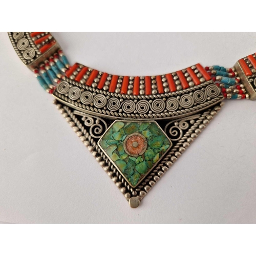 109 - A Heavy Tribal Silver, Coral & Turquoise necklace with very large Pendant poss. Navaho or Eastern