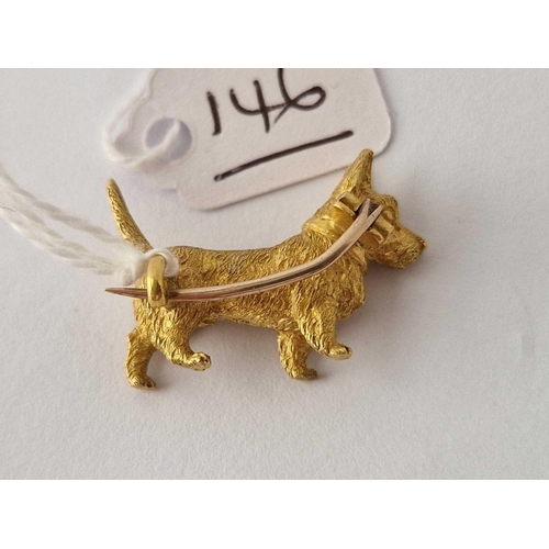 146 - A GOLD BROOCH CAST IN THE FORM OF A DOG HIGH CARAT 11.4 GMS