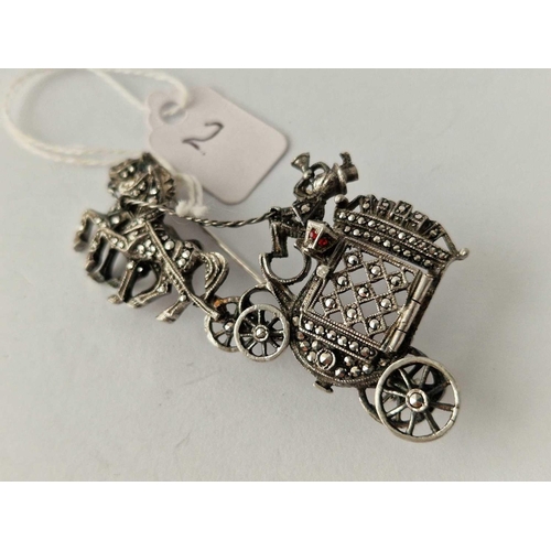 2 - A silver and marcasite horse and carriage brooch