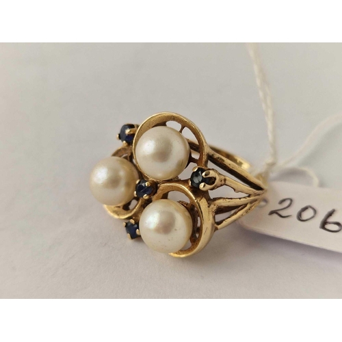 206 - A modernistic pearl and stone set ring, 14ct, size K, 9.3 g. in good plated boxed