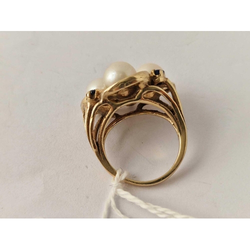 206 - A modernistic pearl and stone set ring, 14ct, size K, 9.3 g. in good plated boxed