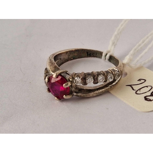 208 - A white gold ruby ring, 14ct, size Q, 5.2 g.