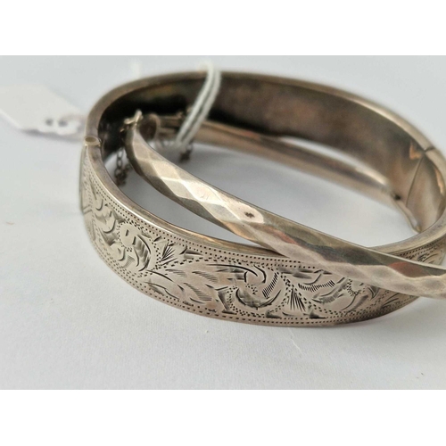 223 - Two silver hinged bangles 31 g.