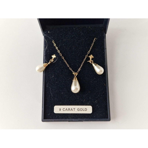 229 - A boxed 9ct and simulated pearls necklace and matching pair of earrings