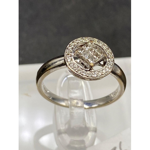 236 - A princess cut diamond cluster ring 18ct gold size L 3.2 gms