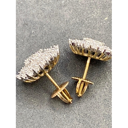 238 - A pair of large diamond cluster earrings with safety screw fittings