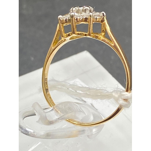 240 - A BRIGHT DIAMOND FLOWER CLUSTER RING 18CT GOLD SIZE L 2 GMS