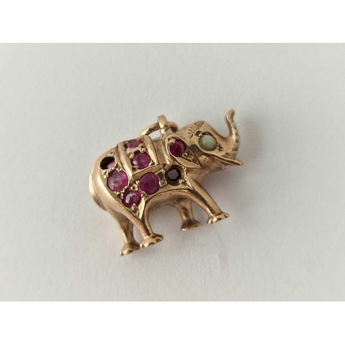 242 - A gold gem set elephant charm some missing 4.4 gms