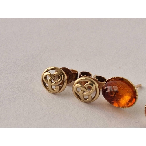 247 - Two pairs of amber Celtic ear studs 9ct