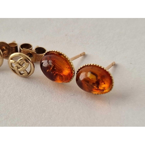 247 - Two pairs of amber Celtic ear studs 9ct