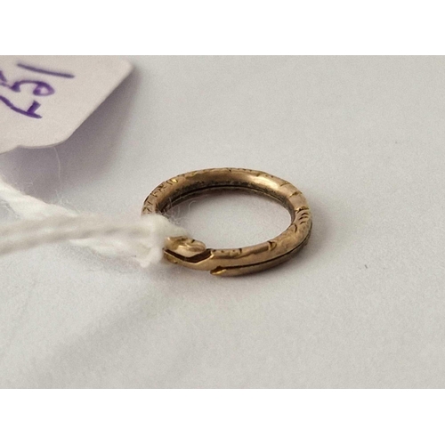 251 - A Victorian small embossed gold split ring 15ct gold tested