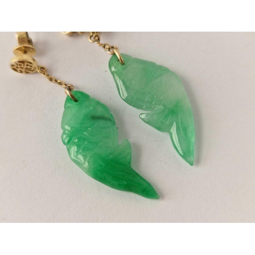 260 - A pair of Chinese gold and jade fish design earrings 14ct gold