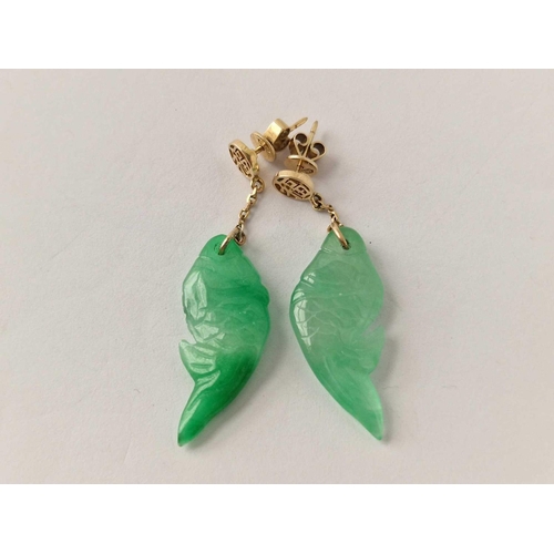 260 - A pair of Chinese gold and jade fish design earrings 14ct gold