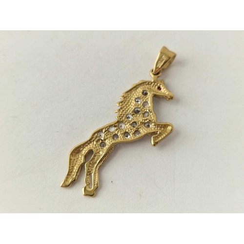 280 - A gem stone pendant  of a horse 9ct gold 3.6g inc