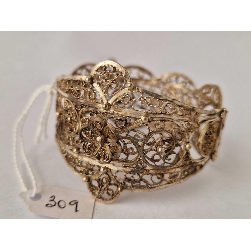 309 - A fancy filigree design wide hinged bangle