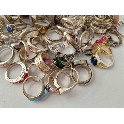 329 - A HUGE QUANTITY OF ASSORTED SILVER RINGS, 518 g.