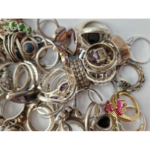 329 - A HUGE QUANTITY OF ASSORTED SILVER RINGS, 518 g.