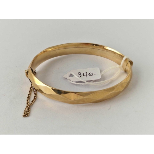 340 - A rolled gold bangle