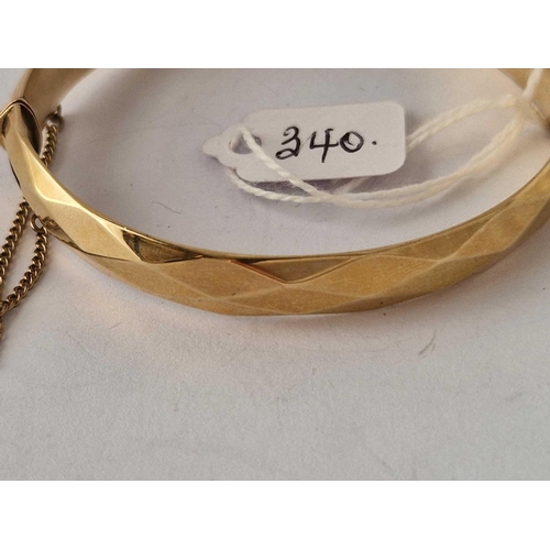 340 - A rolled gold bangle