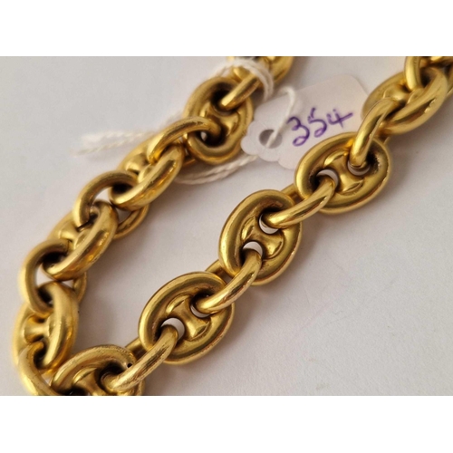 354 - A Victorian yellow metal cable link bracelet 8 inch