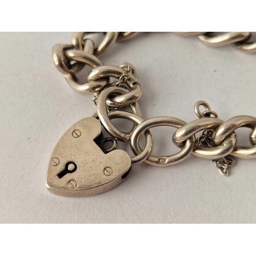 356 - A silver bracelet with padlock clasp, 7 inch