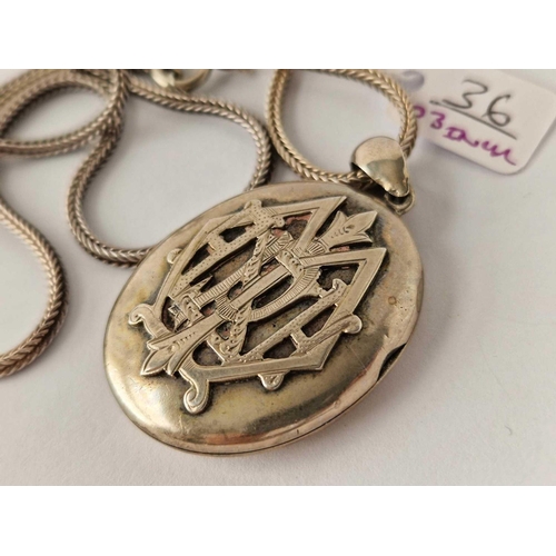 36 - A silver locket on chain 23 inch