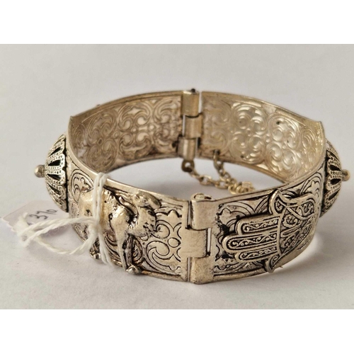 370 - An attractive fancy Egyptian hinged bangle with camels decorations