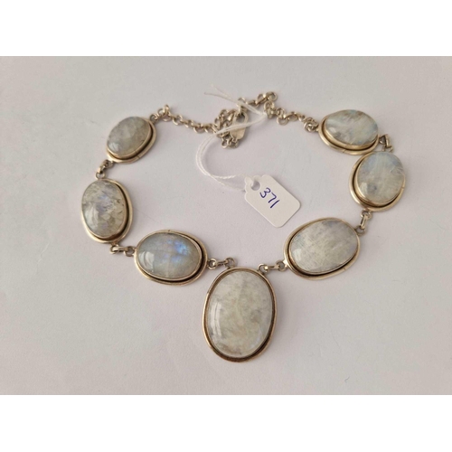 371 - A silver statement necklace set with opaque moonstone 78g