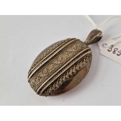 385 - A Victorian oval plated locket